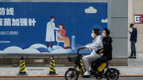 China scraps vax mandate after two days